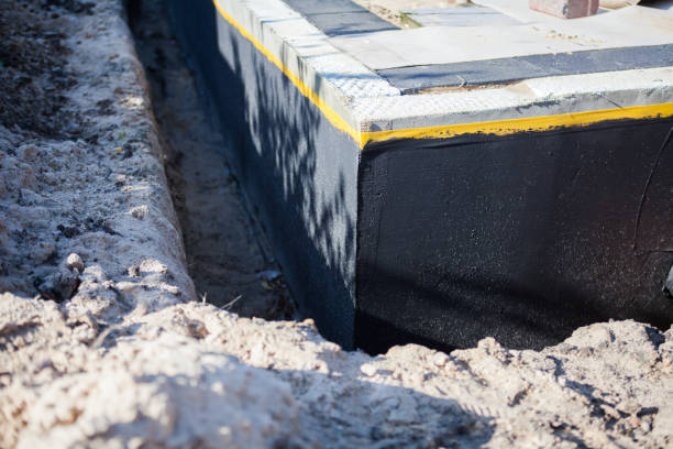 Professional Interior Drainage System technician working in Millville, NJ